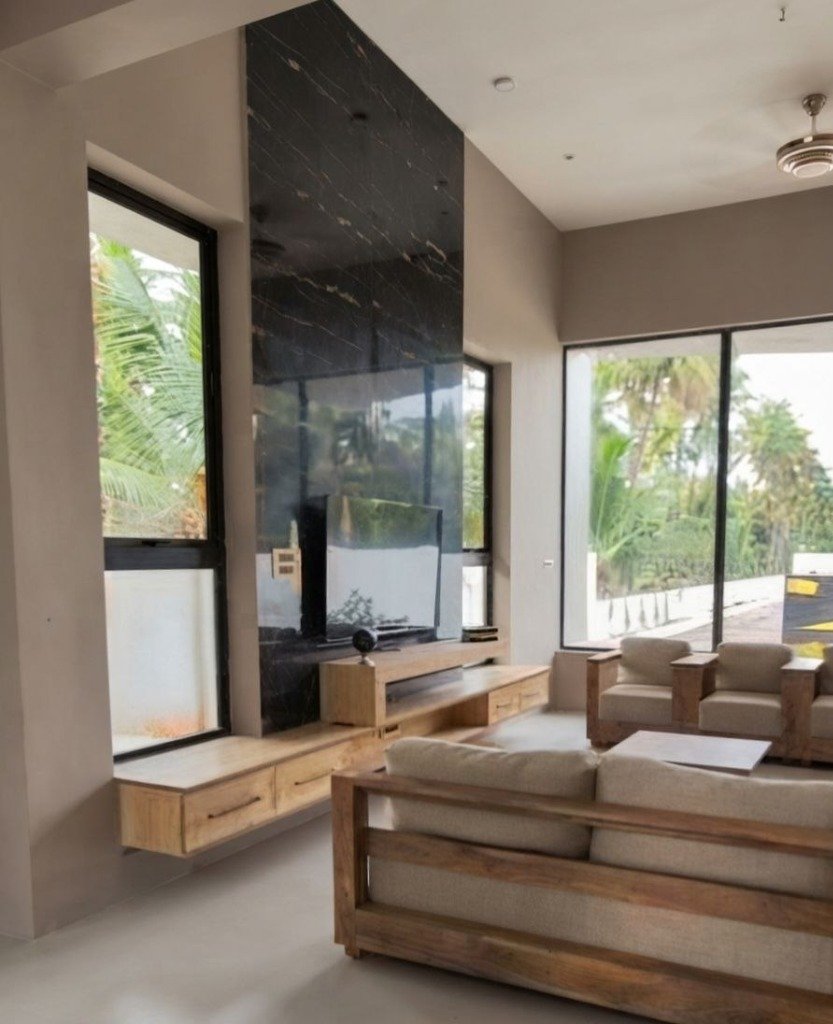 Double-Height Nero Marquina TV Wall